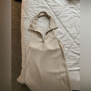 Brand is ANTISTAR, size S, tan color